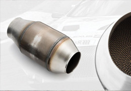 What are the symptoms of a clogged catalytic converter?